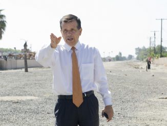 Santa Ana Mayor Miguel Pulido shows the path of the proposed streetcar line.