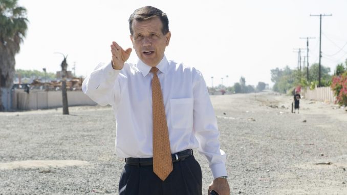 Santa Ana Mayor Miguel Pulido shows the path of the proposed streetcar line.